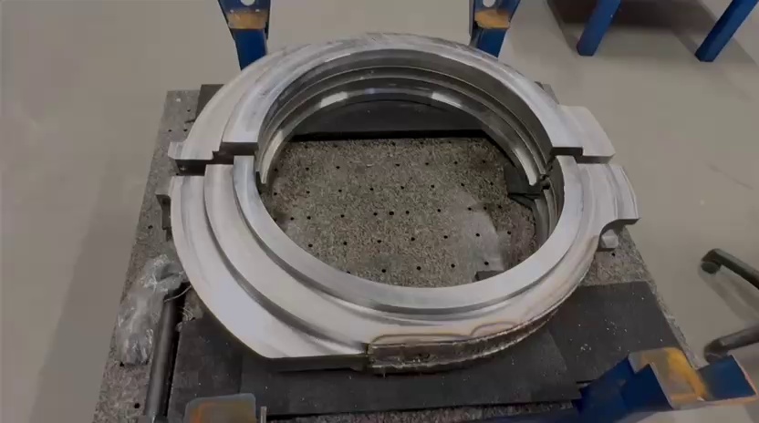 Finished ring-shaped mining-machine holder component after LMD hardfacing on the wear surface